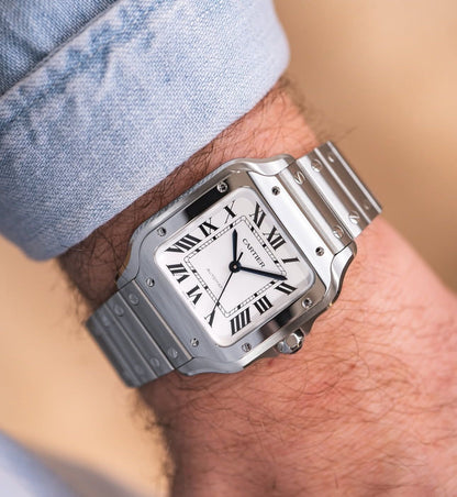 Santos de Large Automatic – 39.8 mm × 47.5 mm. Iconic design, black dial, ADLC bezel, interchangeable strap & timeless elegance